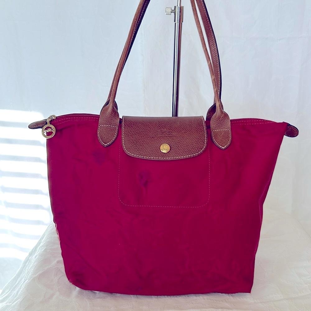 LONGCHAMP  red LE Pliage medium size leather top handle bag.